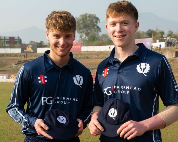 Tom Mackintosh, left, and Jack Jarvis received their debut Scotland caps ahead of the game against Nepal. Image: Cricket Scotland.