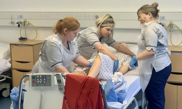 UHI Nursing students are able to practice in a variety of simulated scenarios using the new clinical simulation suite. Image: Garrett Stell/DC Thomson
