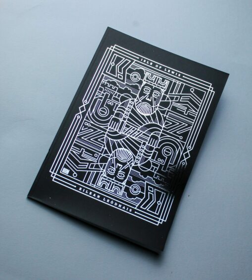 A notebook with a minimalistic, geometric design of the Lewis Chessmen.