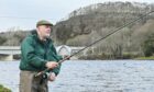 Brian Shaw, director of Ness District Salmon Fishery Board makes the first cast. Image: Jason Hedges/ DC Thomson.