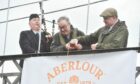 Whisky is poured into river for start of season and anglers cast lines into the water. Picture: (L-R) Allan Sinclair, Clive Murray and guest speaker Ian Gordon. Image: Jason Hedges/DC Thomson.