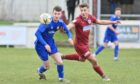 Ross Morrison, left, in action for Lossiemouth against Keith.