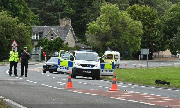 The safety improvements on the A96 are being carried out after concerns were raised about the number of crashes in the area. Pictured is police at the scene of an accident at Brodie in July 2022. Image: Jason Hedges/DC Thomson