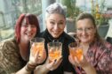 Three guests posed for a photo with their cocktails. Image: Kenny Elrick/DC Thomson