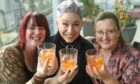 Three guests posed for a photo with their cocktails. Image: Kenny Elrick/DC Thomson