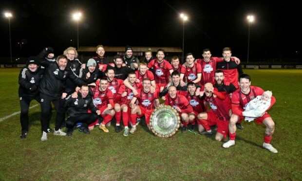 The Fraserburgh squad celebrate after winning the Morrison Motors (Turriff) Aberdeenshire Shield against Buckie Thistle. Pictures by Kenny Elrick