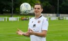 Rothes captain Bruce Milne has signed a new contract.