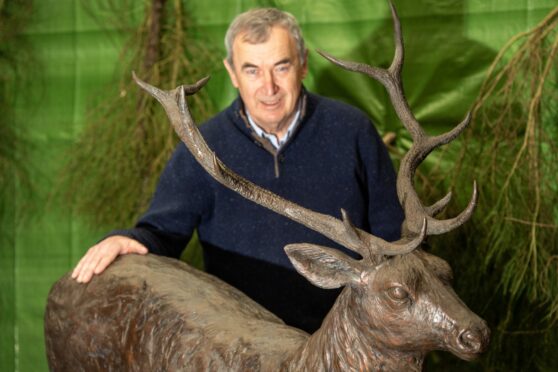 Pat Machray with the bronze deer and hind being auctioned at the Maggie's Valentine's Ball. Kami Thomson/DC Thomson