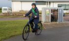 Aberdeenshire Council has launched its own ebike hire project. Helena Leita from the council shows us in this article how to take one of the bikes out for a spin. She's pictured here at Ellon Community Campus on one of the ebikes. Image: Kami Thomson/DC Thomson