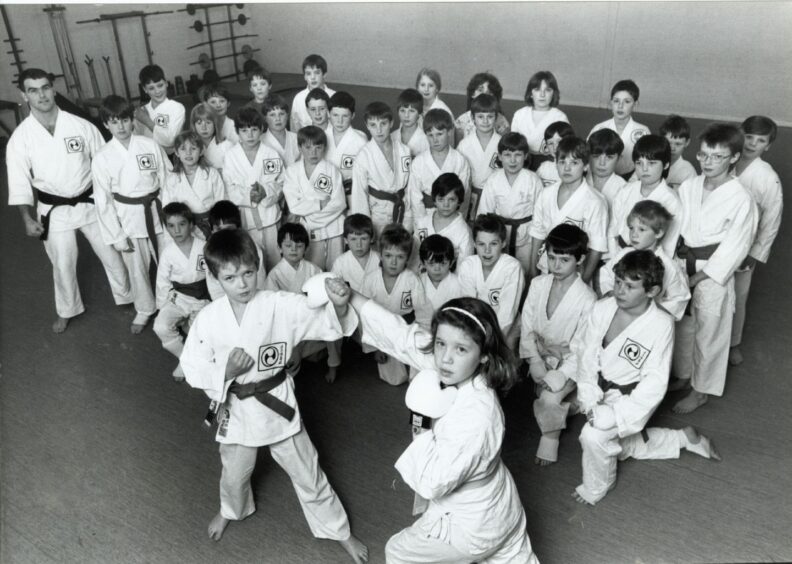 1987 - Ian McTavish and Nicola Sutcliffe demonstrate their karate skills to fellow members of the Aberdeen Freestyle (Ellon) Karate Club.