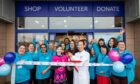 Aberdeenshire teenager Luke McAuliffe who is recovering from cancer joined 
Dr Shin-ichiro Hiraga to officially open Scotland's largest Cancer Research UK superstore at Boulevard Retail Park, Aberdeen. Image: Simon Price/Supplied.