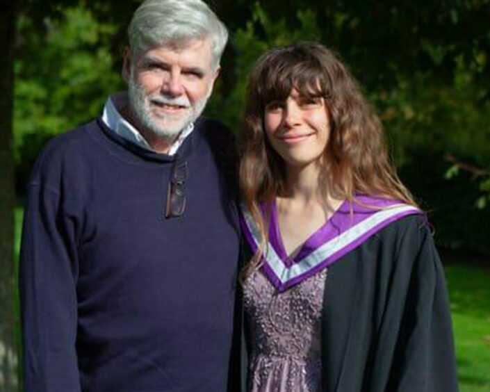 Stephanie McKenna at her UHI graduation with her father