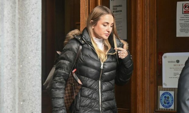 Sacha King leaves Aberdeen Sheriff Court. Image:  DC Thomson