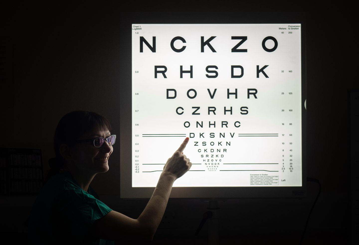 A woman stands in front of an eye chart.Image: Jason Hedges/ DC Thomson