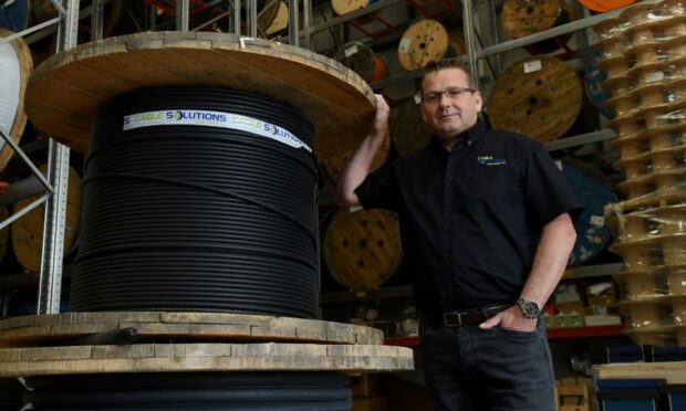Last year's M&A deals included the acquisition of Inverurie cabling firm Cable Solutions Worldwide (CSW) by electrical engineering group Dron & Dickson. In the picture is Colin Fraser, who was CSW's managing director and is now a sales consultant for the firm. Image: Kenny Elrick /DC Thomson