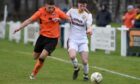 Ryan MacLeman, right, in action for Forres Mechanics. Image: Sandy McCook/DC Thomson