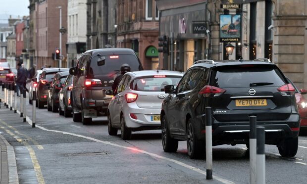 An Inverness GP says cutting back traffic is essential for improving air quality - and people's health. Image: Sandy McCook/DC Thomson