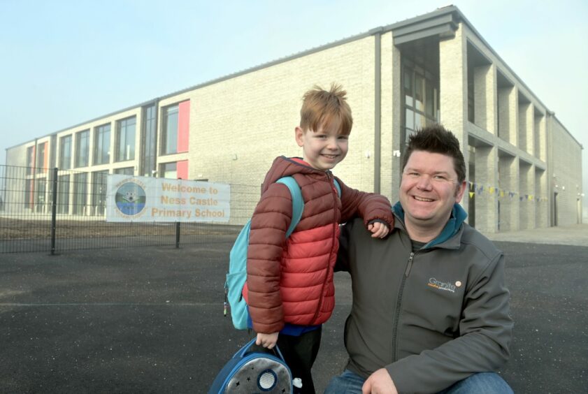 Pupil Lloyd Robertson and his father Stuart were first on the scene for the Ness Castle Primary School grand opening