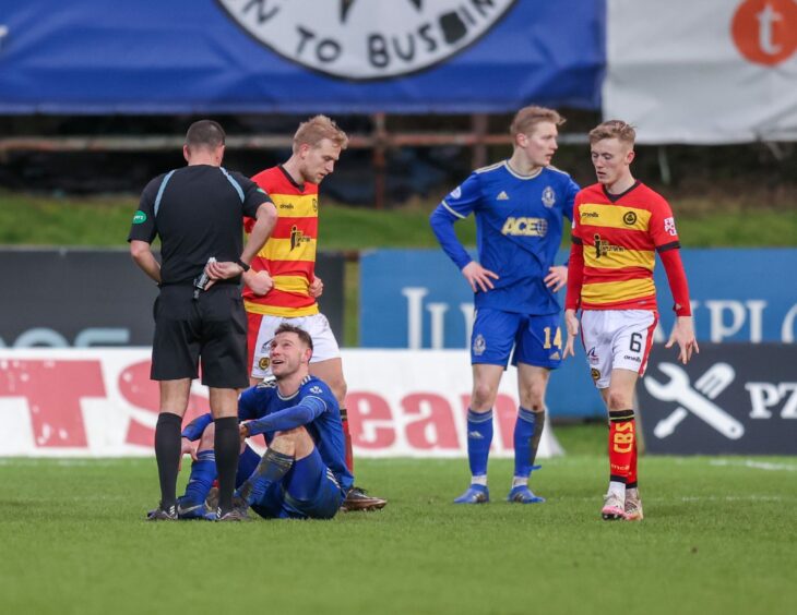 Cove Rangers skipper Mitch Megginson looks on after a late foul against Partick Thistle. Image: Dave Cowe