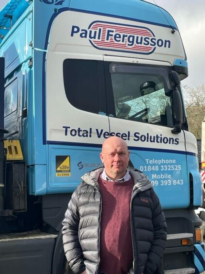 Paul Fergusson in front of Paul Fergusson lorry
