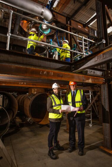 Iain MacGregor, RSE managing partner, with James Gibbs, HIE area manager at the RSE plant in Muir of Ord