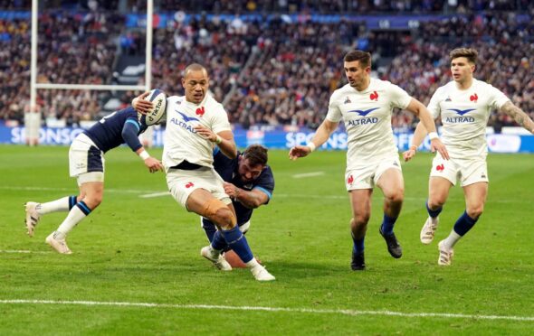 France's Gael Fickou goes through for the clinching try in Paris.