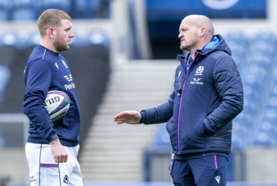 Finn Russell (left) and head coach Gregor Townsend in conversation during last year's Six Nations.