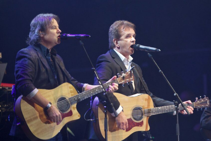 Runrig's Bruce Guthro and Donnie Munro are side by side in 2013. Image: Paul Campbell.