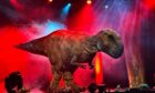 T-Rex over audience in Jurassic Live show.