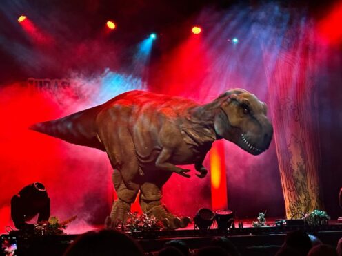 T-Rex over audience in Jurassic Live show.