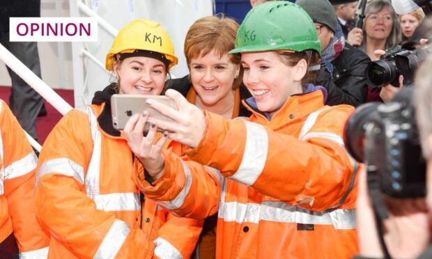 Nicola Sturgeon poses for a photo at the 2017 launch of ferry Glen Sannox at Ferguson Marine shipyard in Port Glasgow in Inverclyde (Image: Duncan Bryceland/Shutterstock)