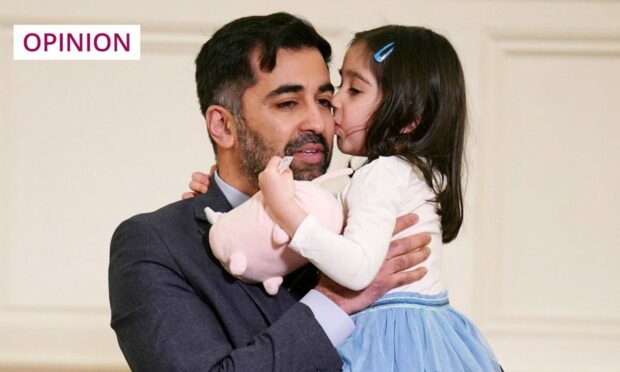Health secretary and SNP leadership hopeful, Humza Yousaf, with his daughter, Amal (Image: Andrew Milligan/PA)