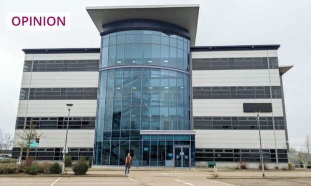 Columnist Colin Farquhar stands in front of Taqa House - now known as Pavilion 1 - in Westhill (Image: Colin Farquhar)