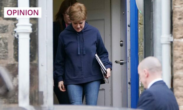 Nicola Sturgeon leaves Bute House in Edinburgh, dressed in casual clothes, after making her resignation announcement (Image: Andrew Milligan/PA)