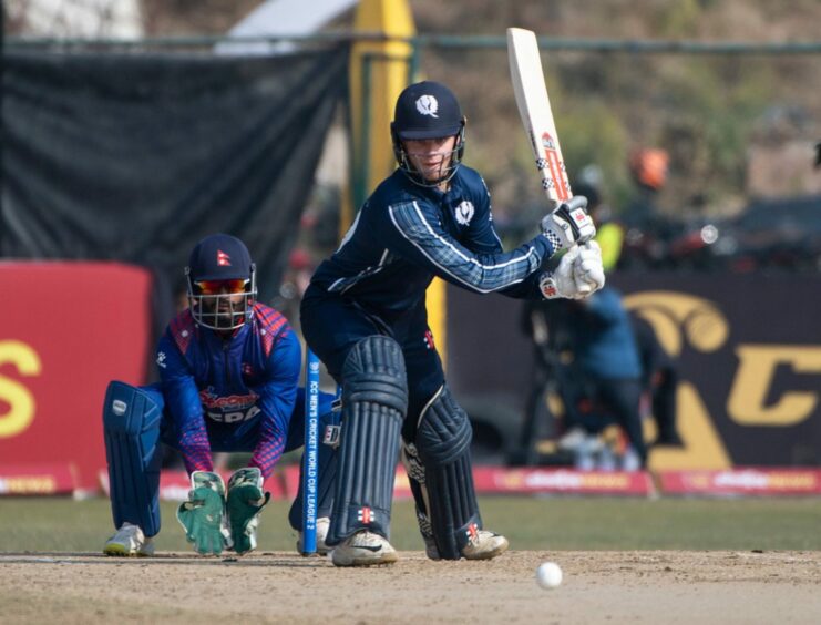 Scotland's Tom Mackintosh on his debut against Nepal. Image: Cricket Scotland