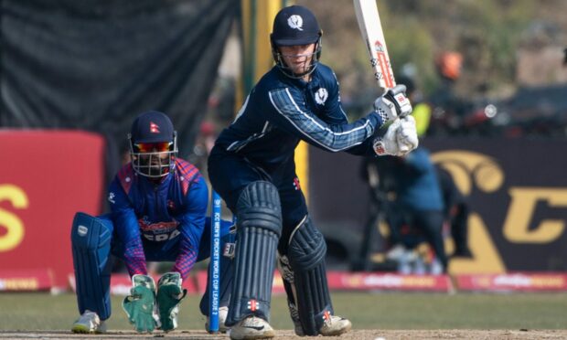 Scotland's Tom Mackintosh on his debut against Nepal. Image: Cricket Scotland