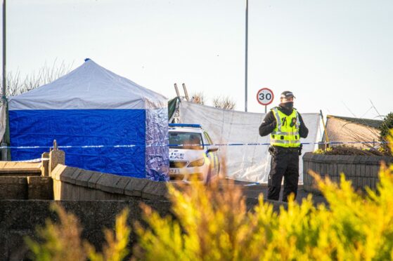Police tent covering the scene at Ives Road in Peterhead. Image: Wullie Marr / DC Thomson