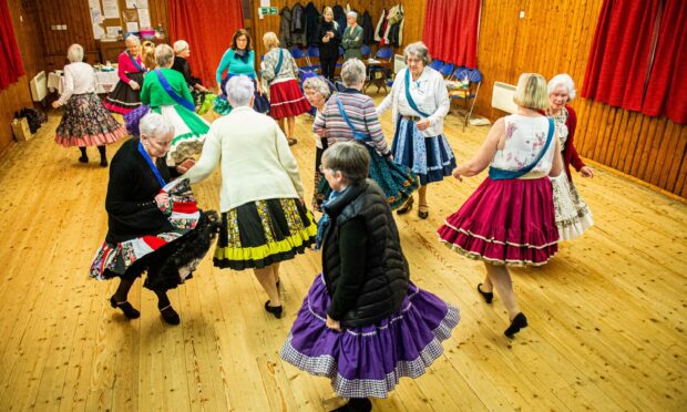 The Aberdeen Kilt Kickers hosted a special dance evening on Monday to hand over the money they had raised for charity Ovacome. Image: Wullie Marr/DC Thomson.