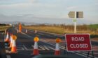 The A96 Aberdeen to Inverness road was closed for more than three hours as teams dealt with the incident. Image: Donna MacAllister/ DC Thomson.