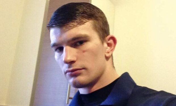 Zeke McKnight held two knives to his mum's throat. Image: Facebook