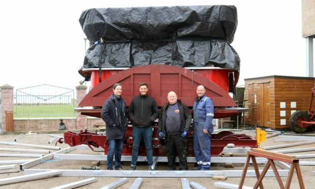 Codona's has enjoyed a strong year of trading following easing of Covid travel restrictions Picture shows left to right: Alfred Codona, Jack Codona, Andy Bates and Raymond Eddie next to waltzers during refurbishment. Image: Codona's
