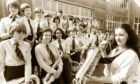 Saxophonist Annette Young leads members of Linksfield Academy's concert band in 1981. Image: DC Thomson.