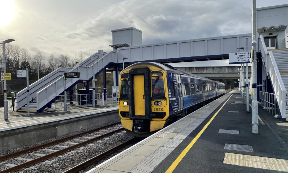 ScotRail train at Inveress Airport station. 