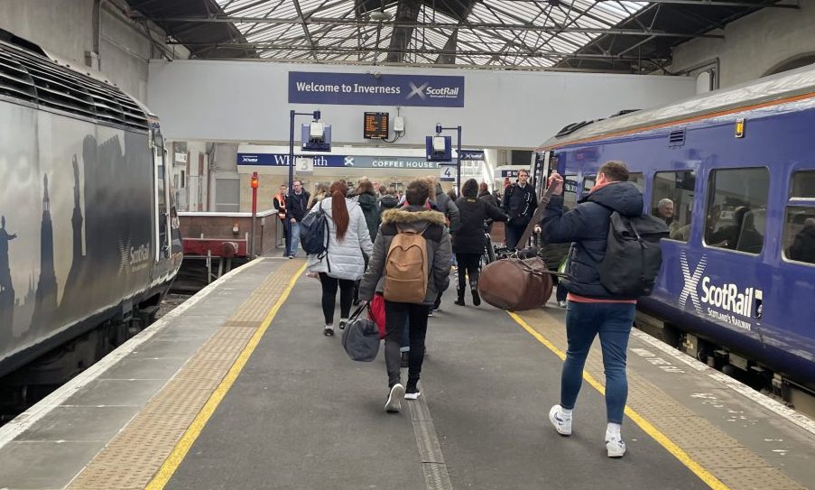 Passengers getting off train at Inverness railway station. 