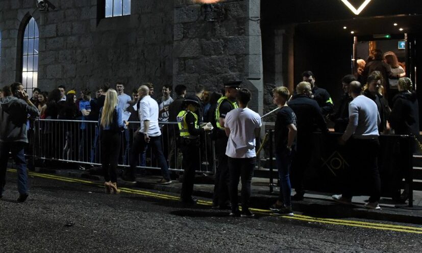 People waiting to enter an Aberdeen nightclub. GPs want to be able to close their lists in the same way.