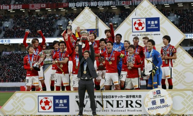 Ricardo Rodriguez and his Urawa Red Diamonds team celebrate their  Emperor's Cup success in December 2021. Image: Shutterstock.