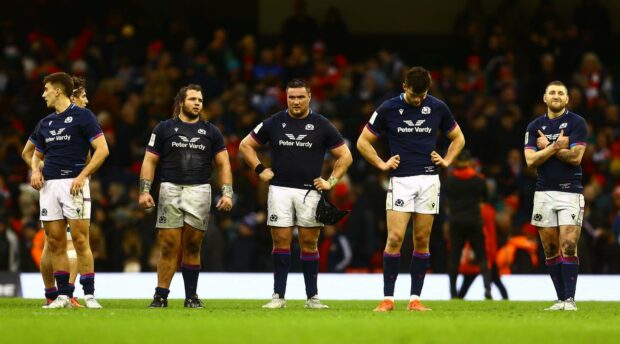 Dejected Scots at the end of the last year's game in Cardiff.