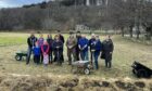 A group of volunteers breaking ground on the new Aberlour Community Garden. Image: Andrew Kimmitt.