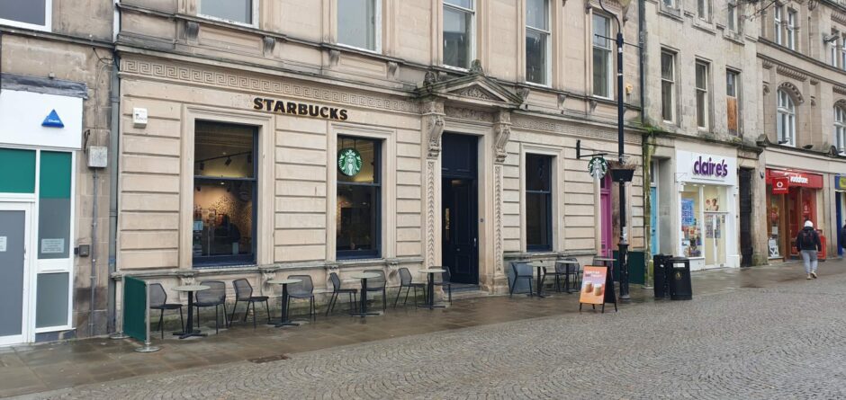 The current Starbucks store on Elgin High Street is pictured.