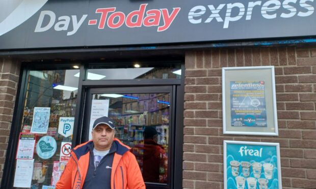 Iqbal Mohamed at his Oban shop.